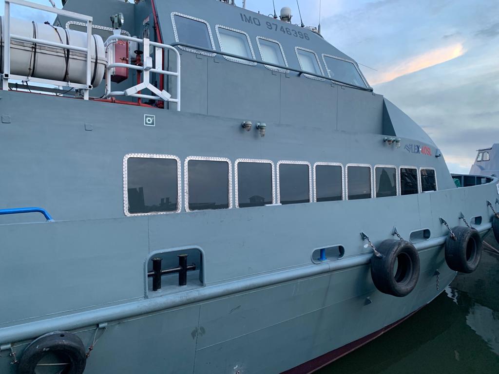 Grey steel support vessel with IMO 9746396 marked on the hull